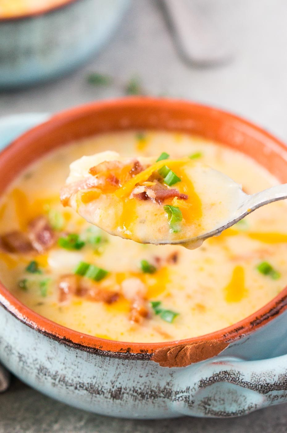taking a spoonful of soup