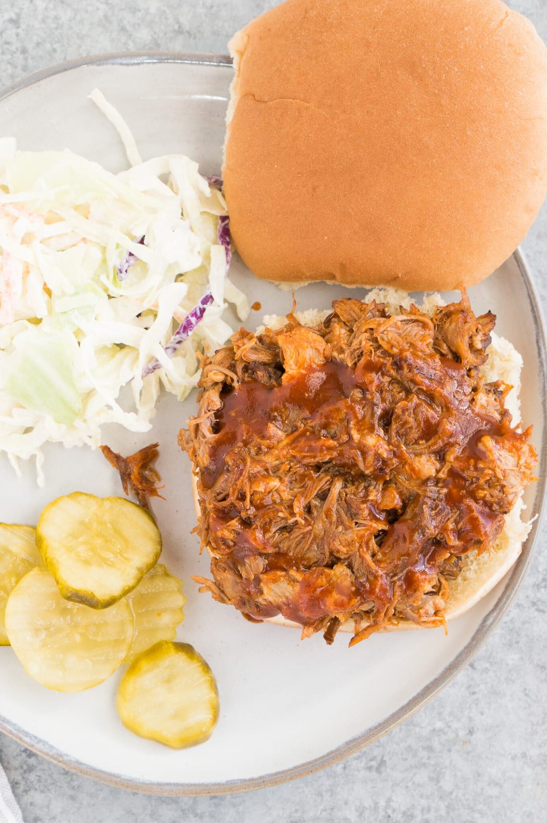 instant pot pulled pork served on a bun