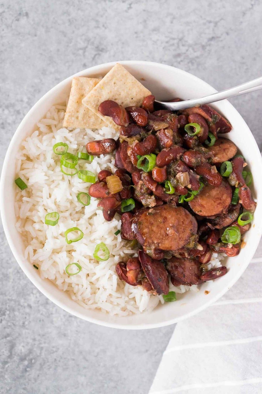 savory red beans, kielbasa served over rice in a bowl