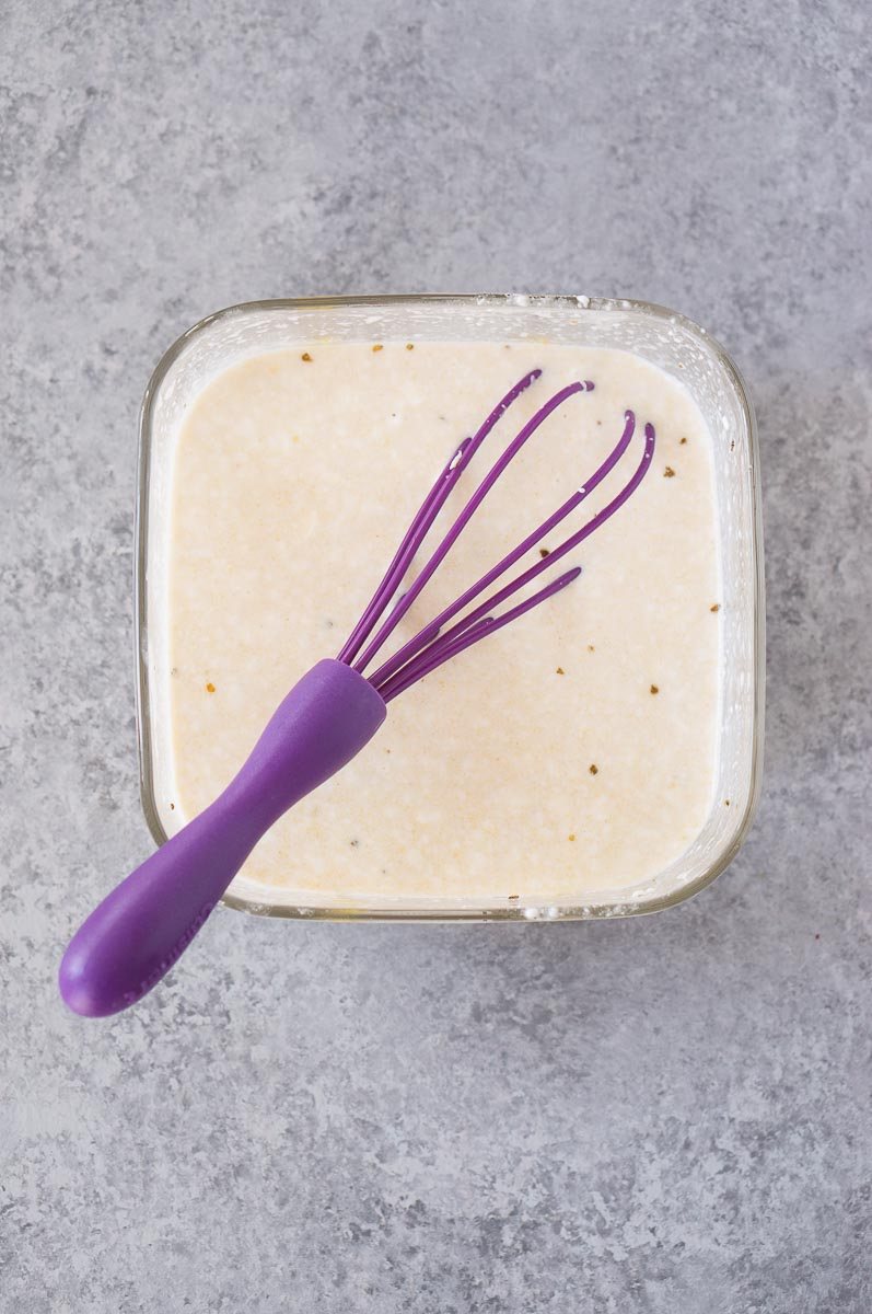 mixing cream cheese with soup