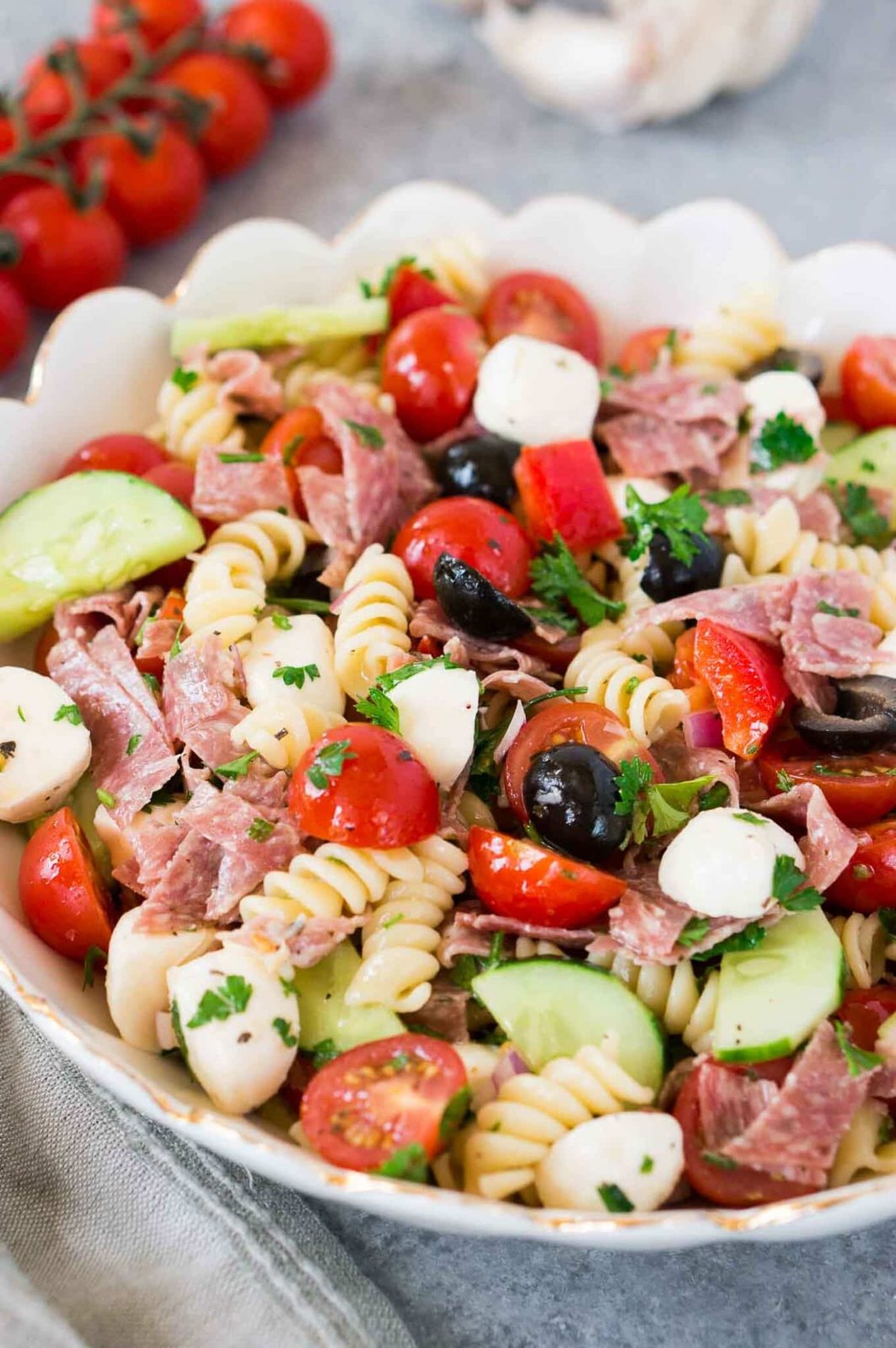 close up shot of a bowl with healthy Italian pasta salad and vegetables