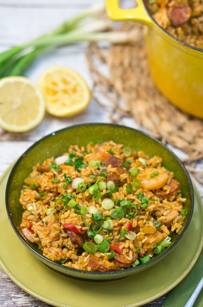 jambalaya served in a bow with fresh herbs