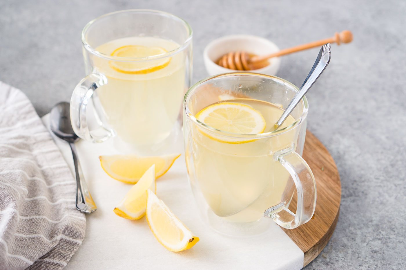 honey lemon tea in two glass cups