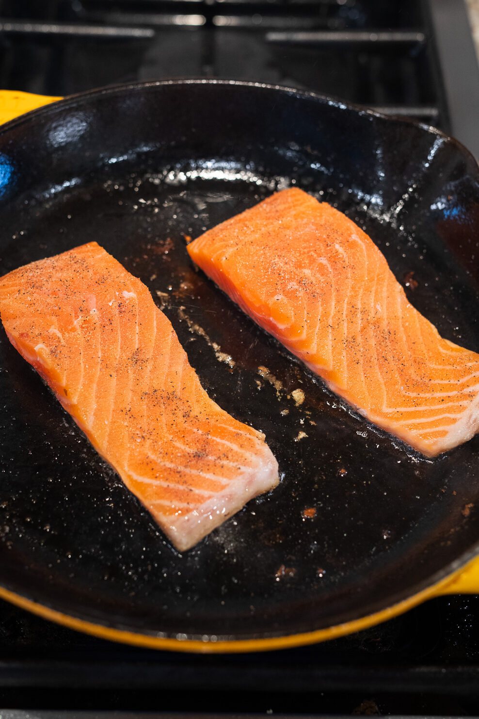 searing the salmon fillets
