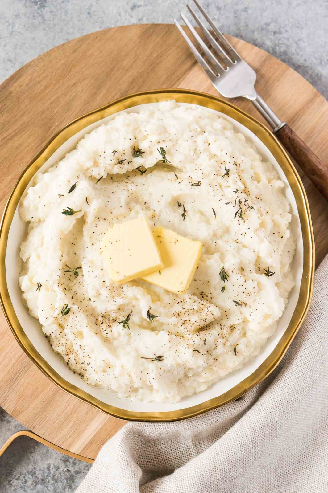 keto mashed cauliflower in a white bowl