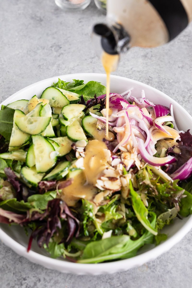dressing salad with honey mustard vinaigrette