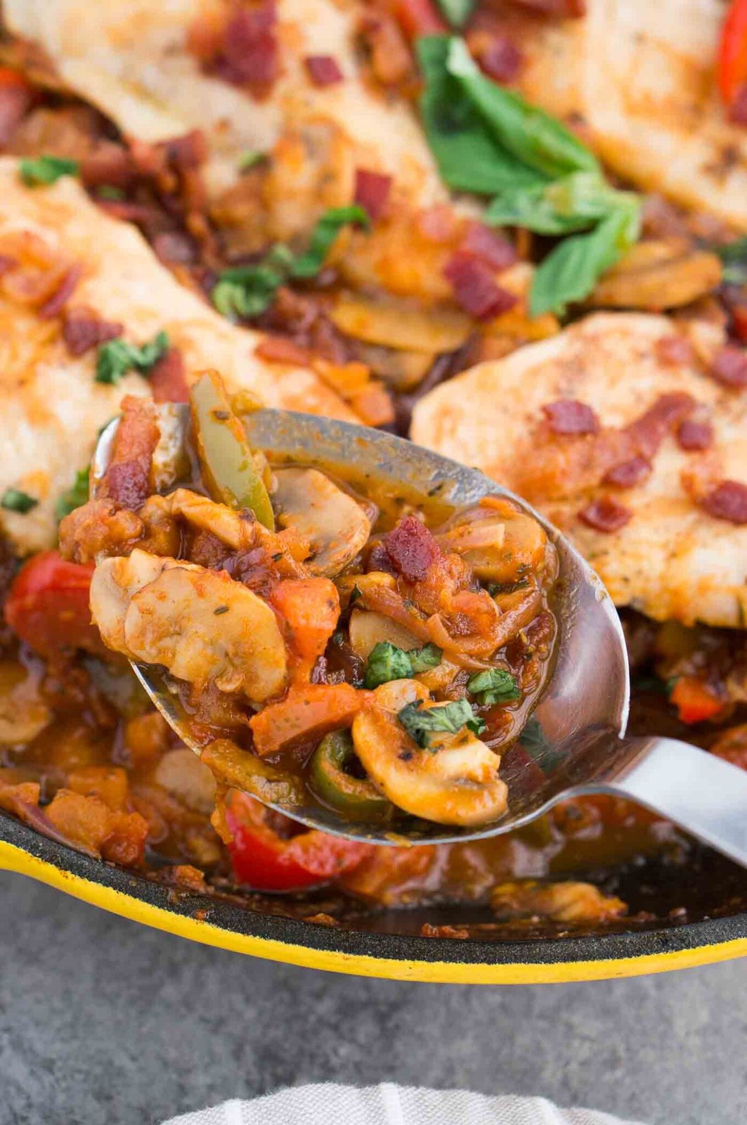 Italian chicken cacciatore with mushrooms, peppers in a savory tomato sauce