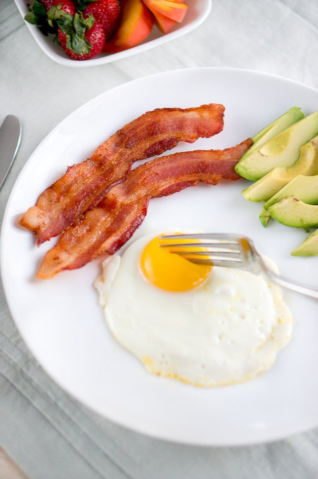 A fork cutting into the yolk