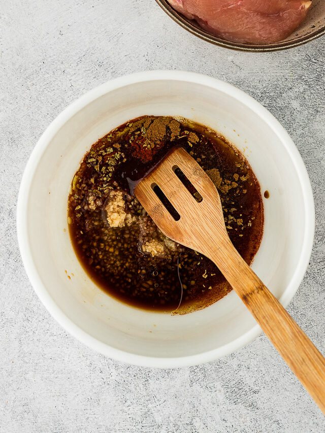 mixing marinade ingredients in a bowl
