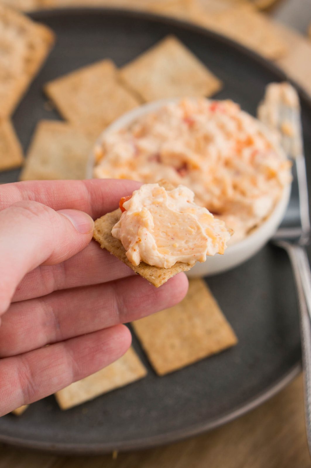 cheese spread on a cracker