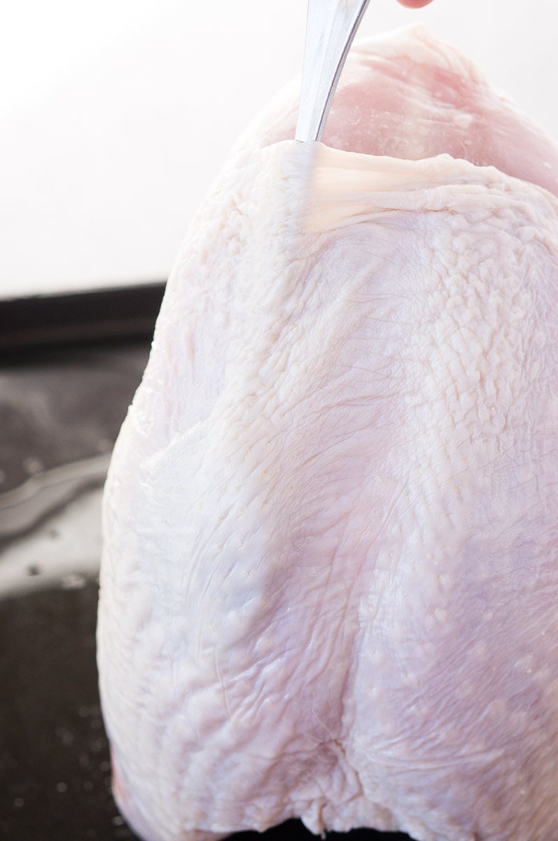 separating the skin from the turkey meat