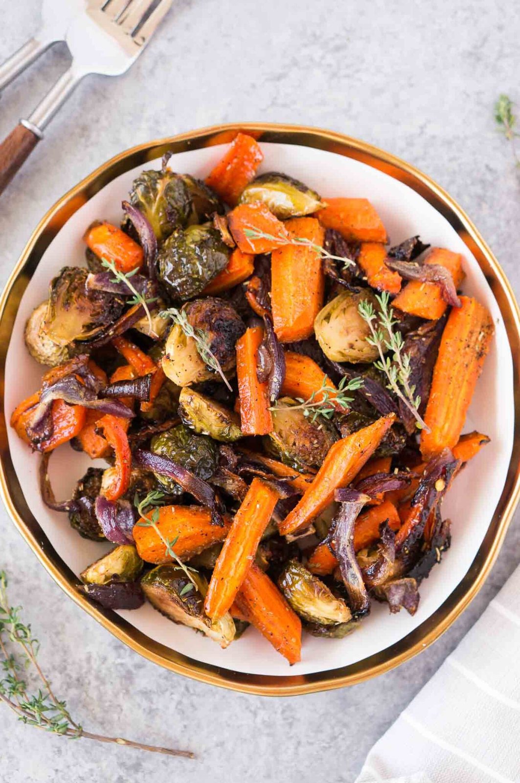 roasted Brussels spouts and carrots in a bowl