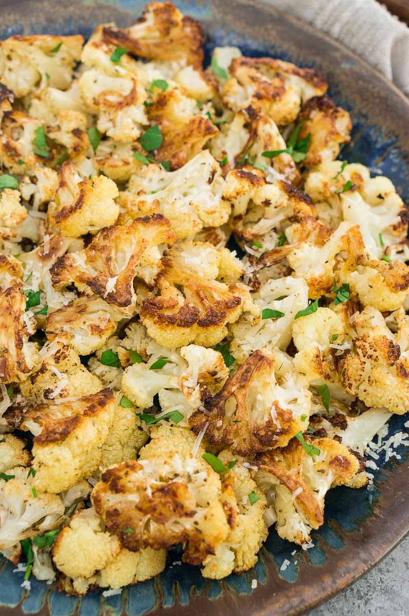 close up shot of roasted garlic cauliflower in a plate