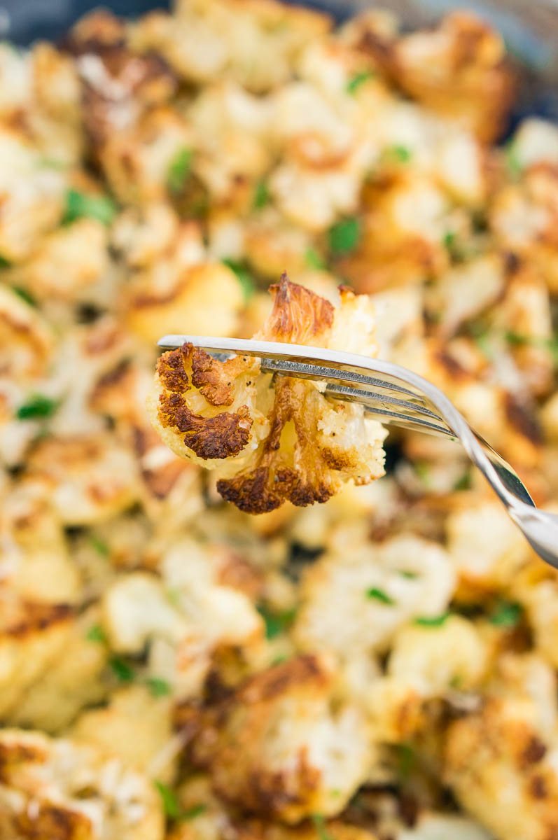 close up of cauliflower on a fork