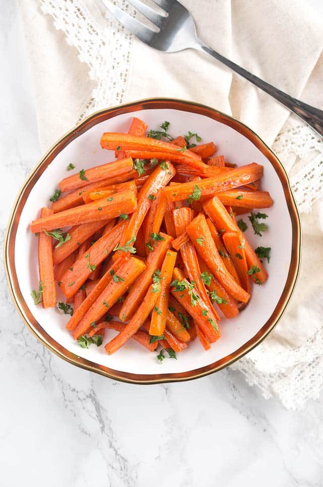 oven Roasted Carrots served in a serving bowl