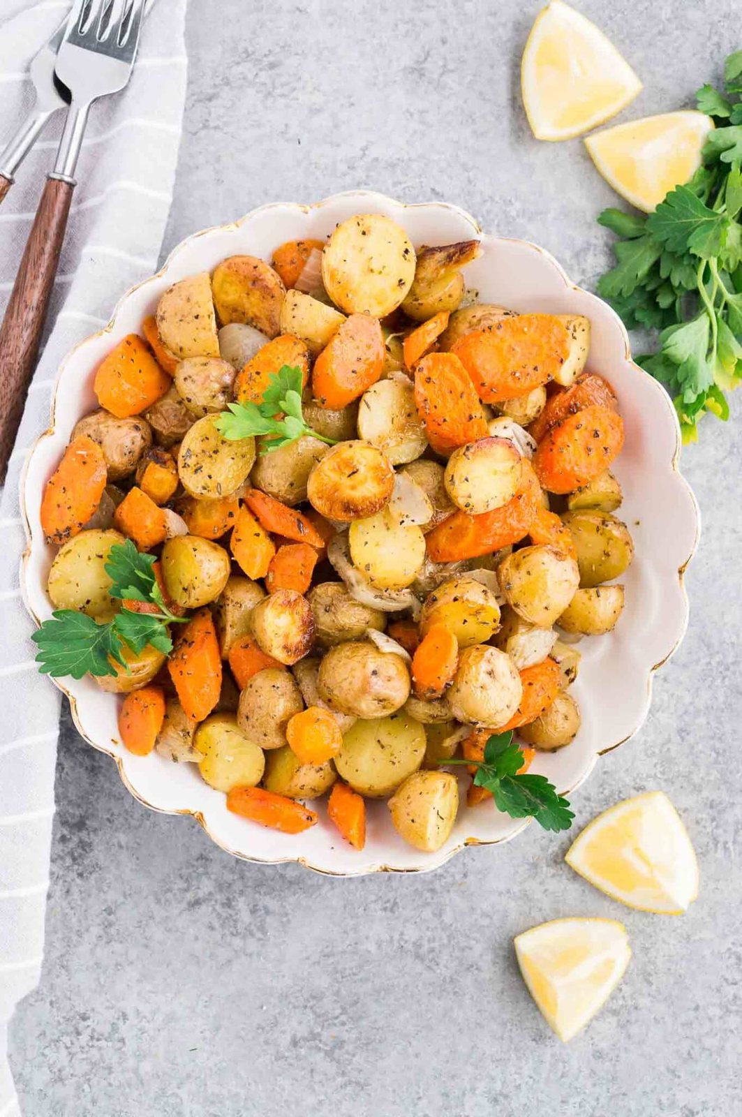 roasted carrots and potatoes in a serving bowl