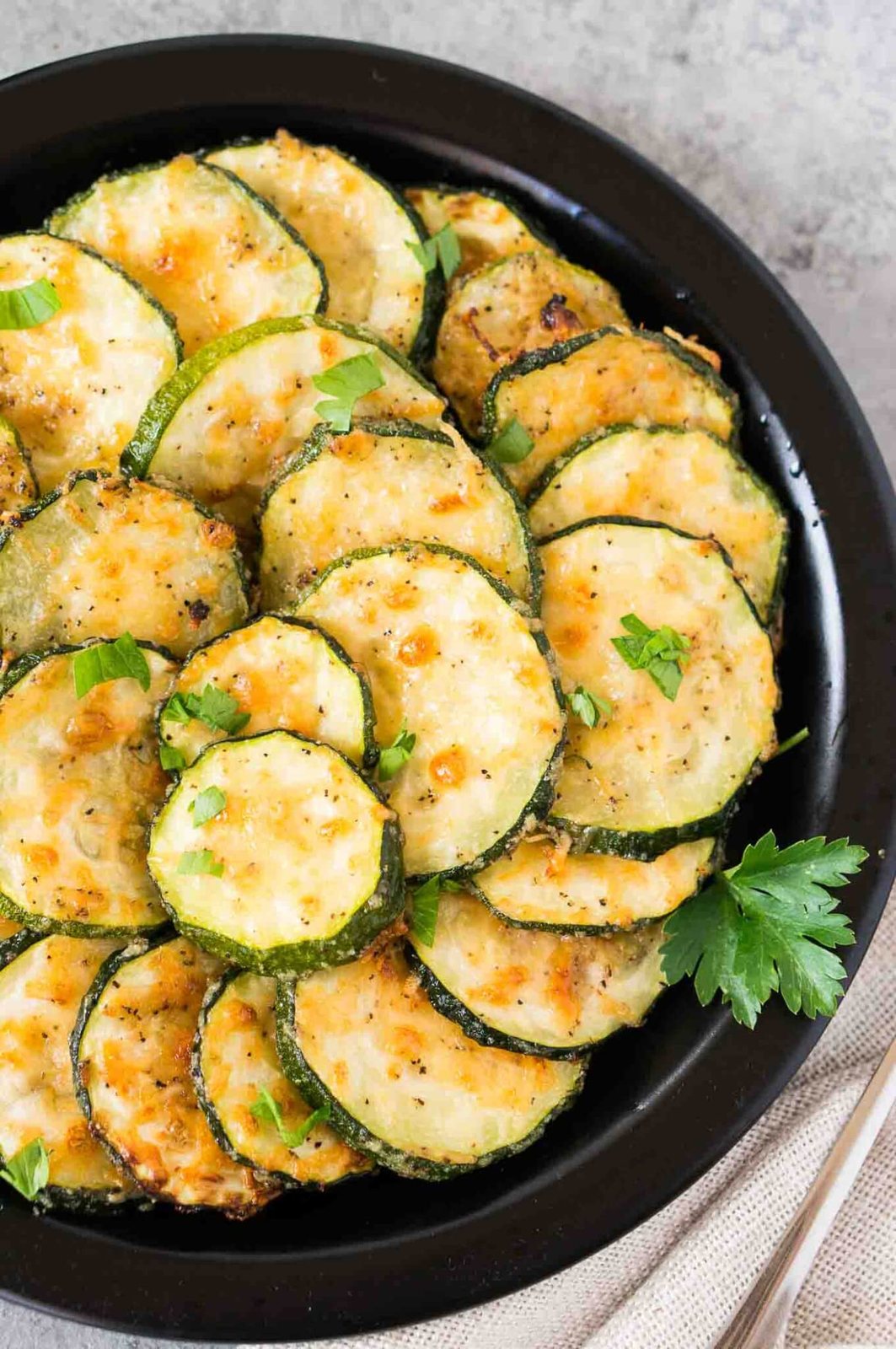 close up image of zucchini slices on a plate