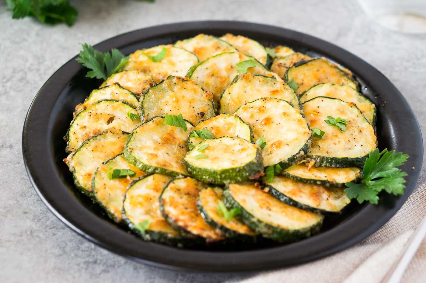roasted zucchini slices on a plate