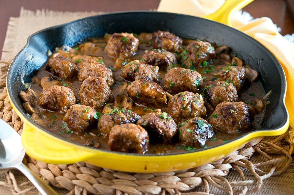 Salisbury Steak Meatballs w/ Mushroom Gravy is a great dinner idea for busy weeknights. It comes together in 30 minutes - so delicious & comforting!