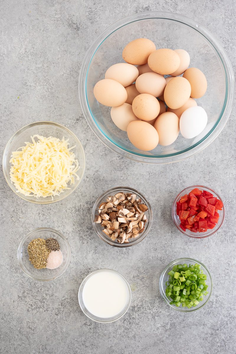 eggs, veggies and cheese on a board