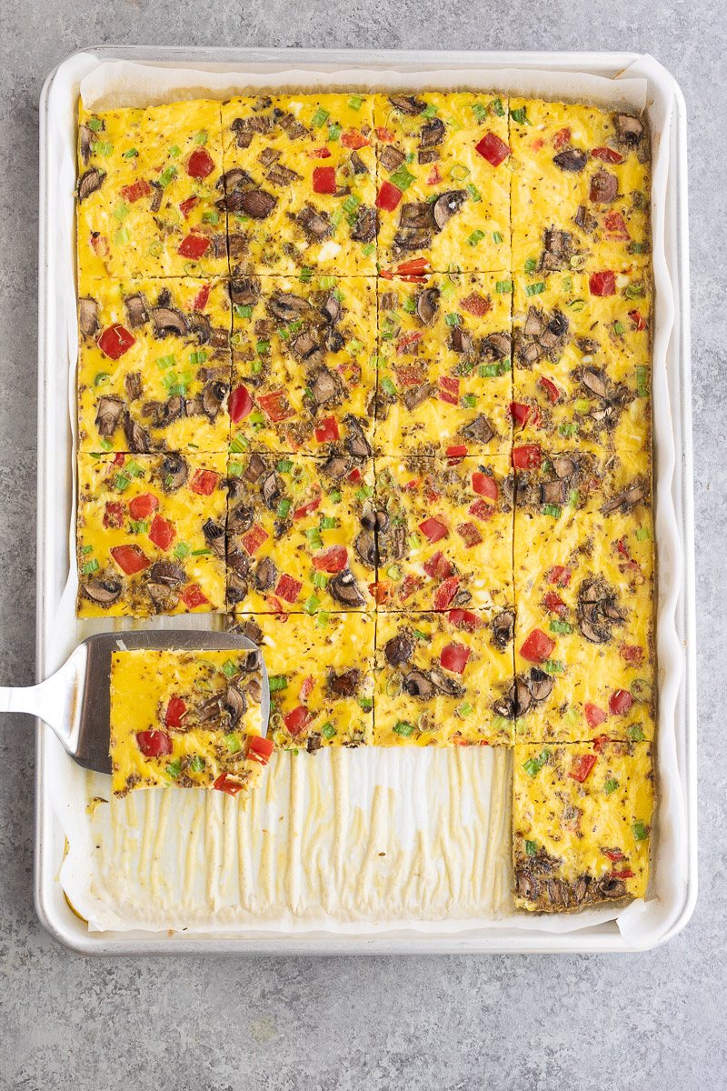 cutting egg squares from eggs made in a baking sheet
