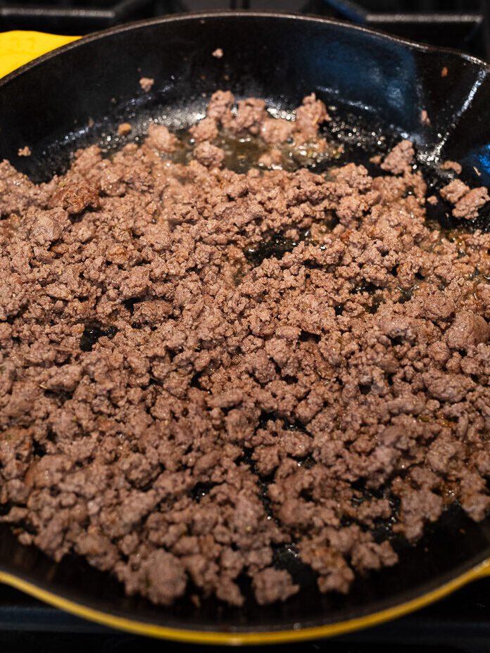 cooking ground beef in a skillet