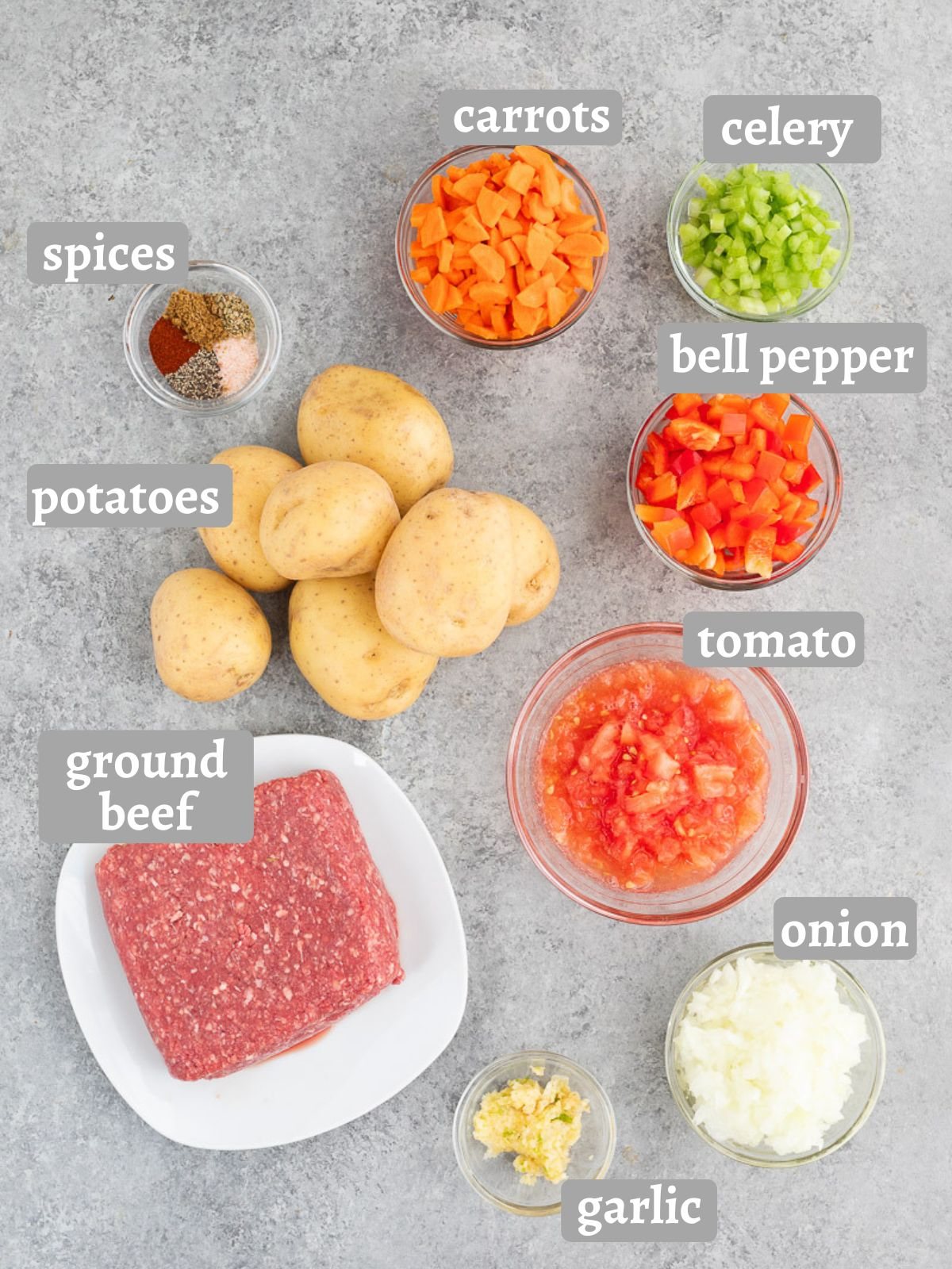 moussaka ingredients - potatoes, beef and vegetables