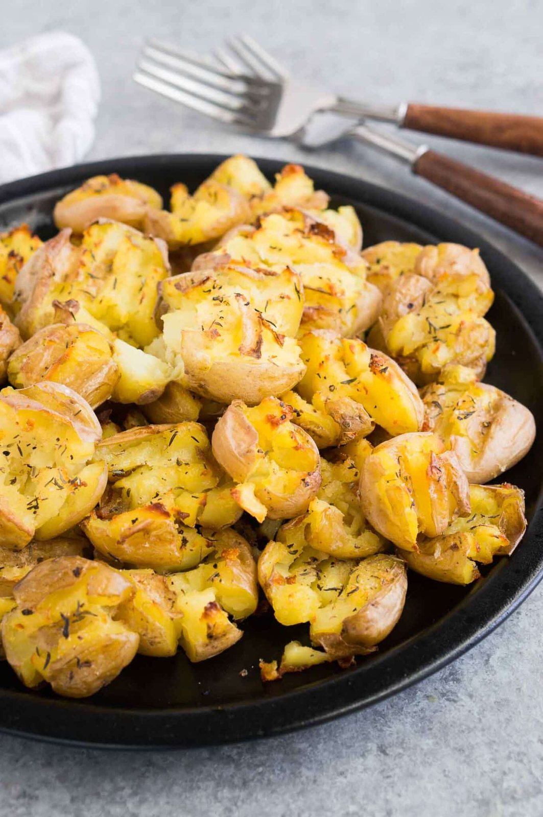 crispy smashed potatoes on a plate