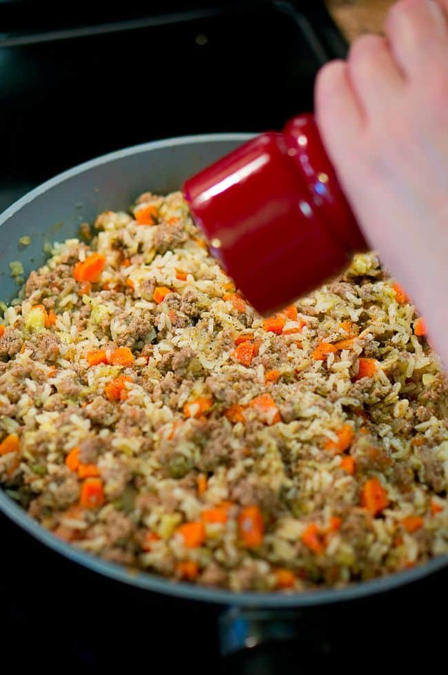 The filling being cooked in a pan