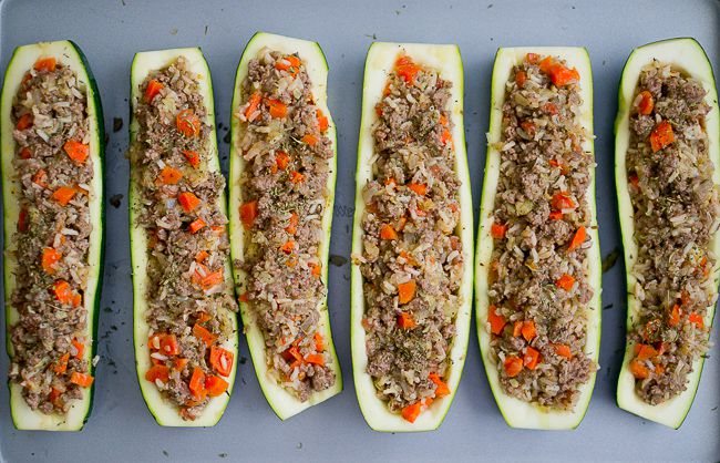 The Stuffed Zucchini Boats on a baking sheet before being cooked