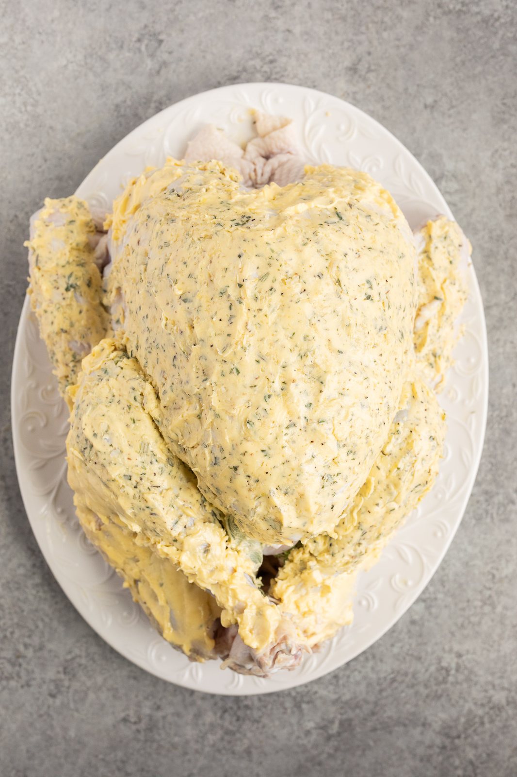 turkey rubbed with seasoned herb butter