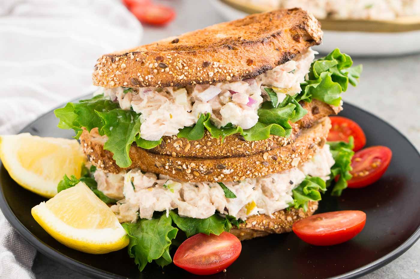stacked tuna sandwich on a plate