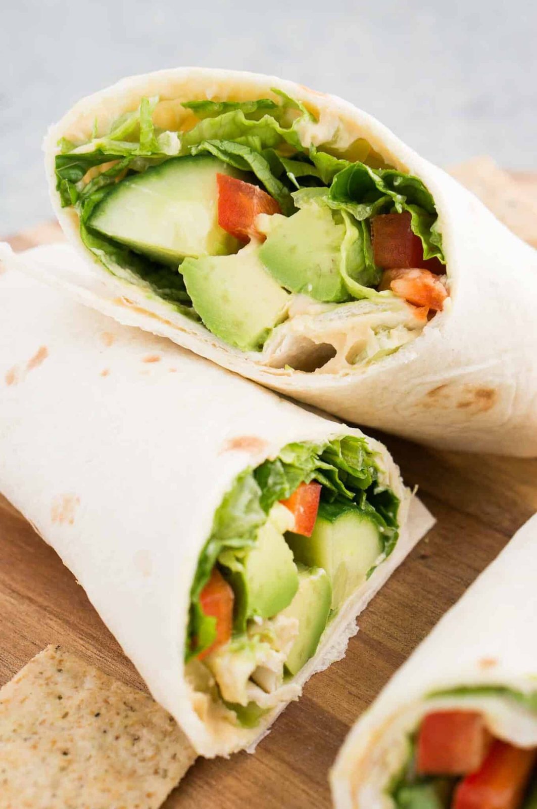 close up image of hummus veggie wrap