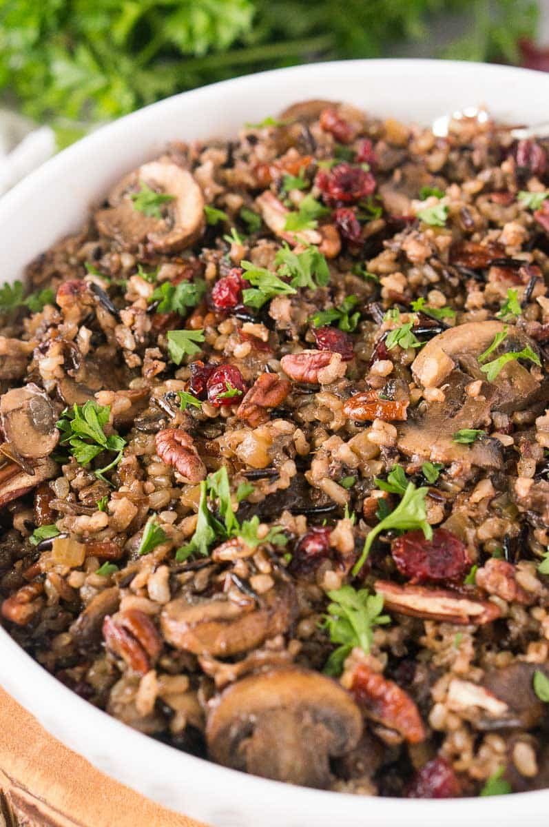 thanksgiving mushroom wild rice side served in a white bowl