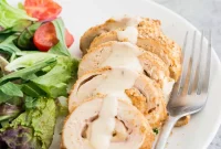 Golden Baked Ham and Cheese Stuffed Chicken