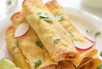 Cheesy Baked Chicken and Bean Taquitos