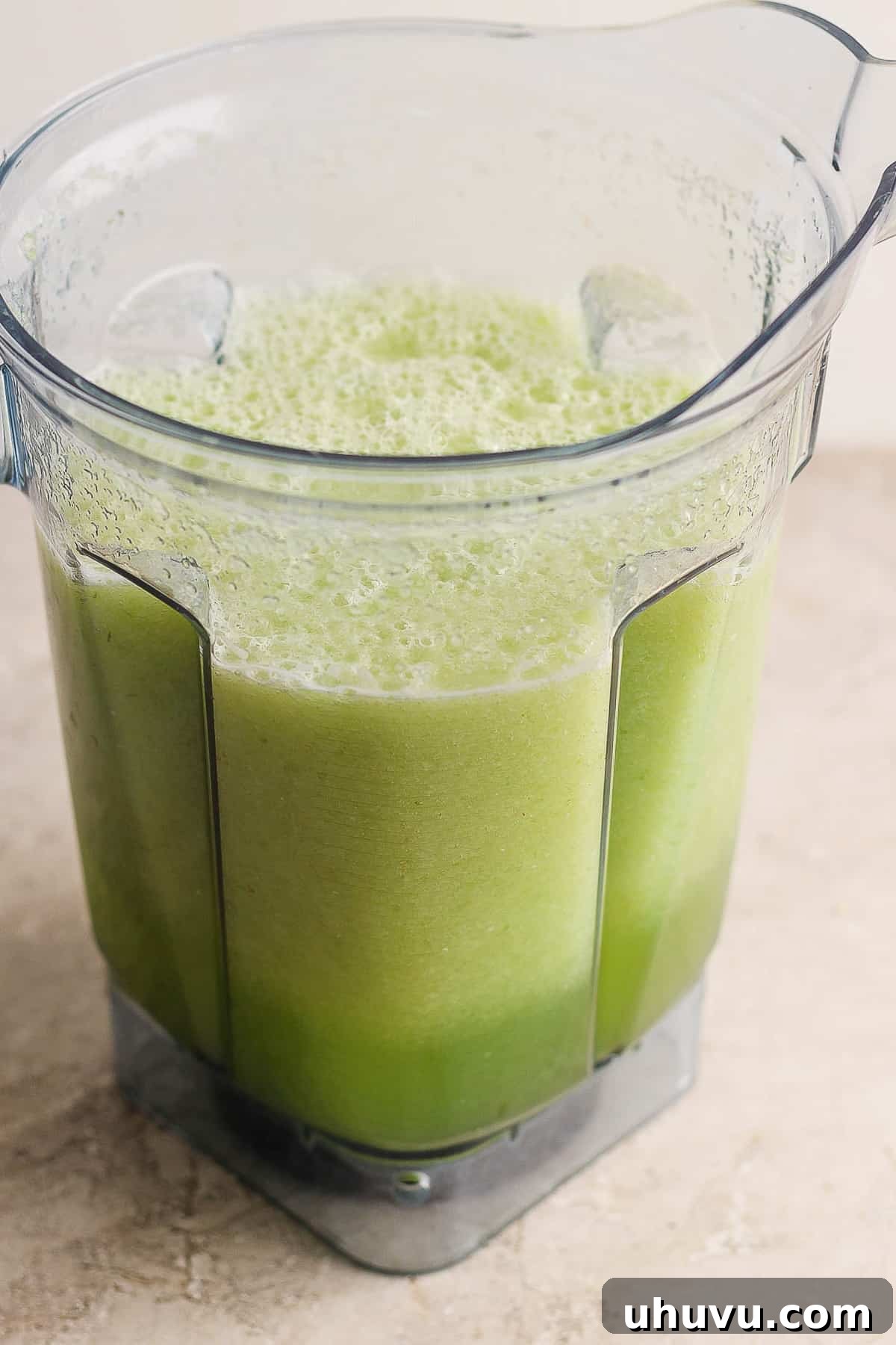 Smooth, blended Agua de Pepino mixture inside a blender, before being strained to remove any solids.