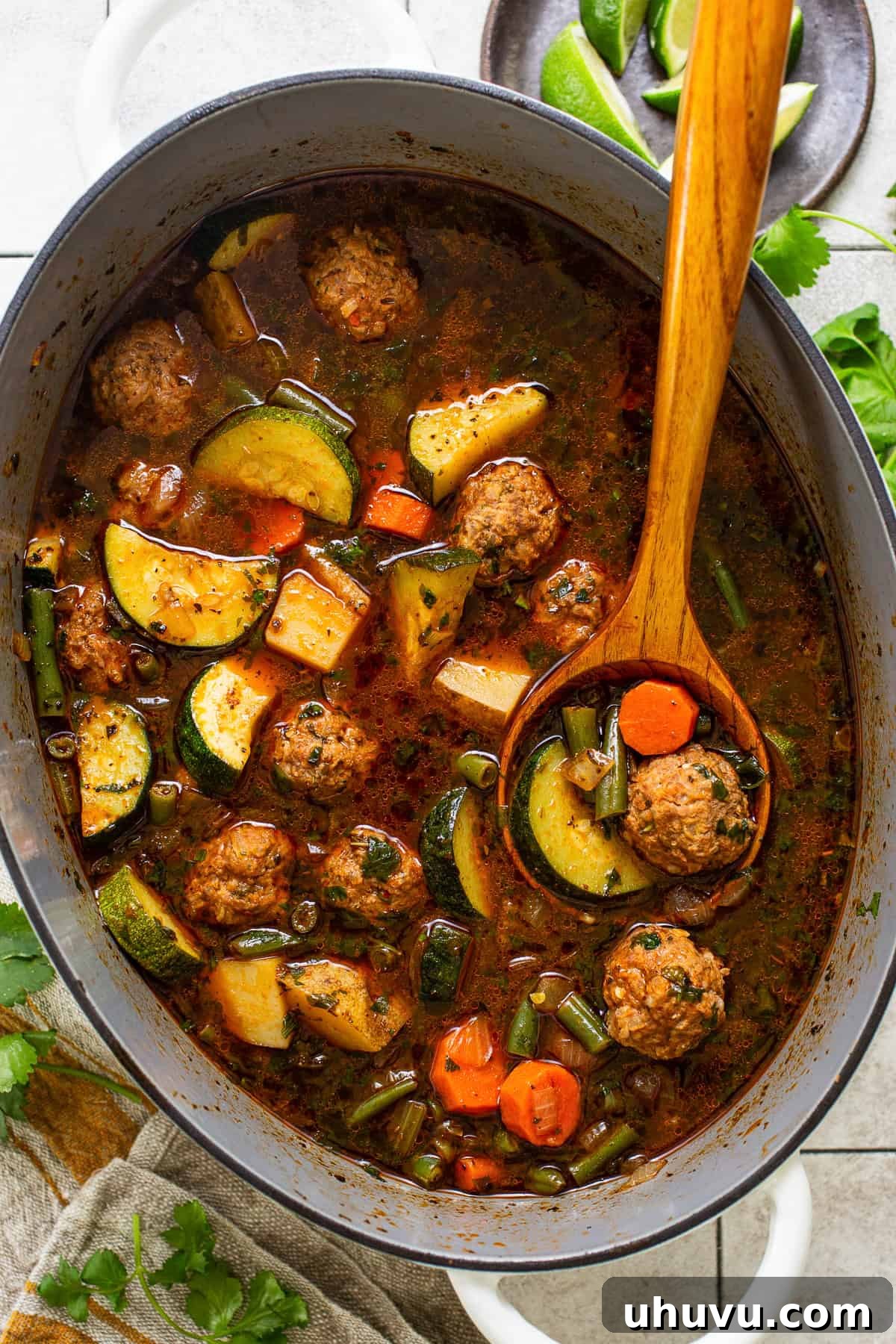 Albondigas soup ready to eat in a Dutch oven.