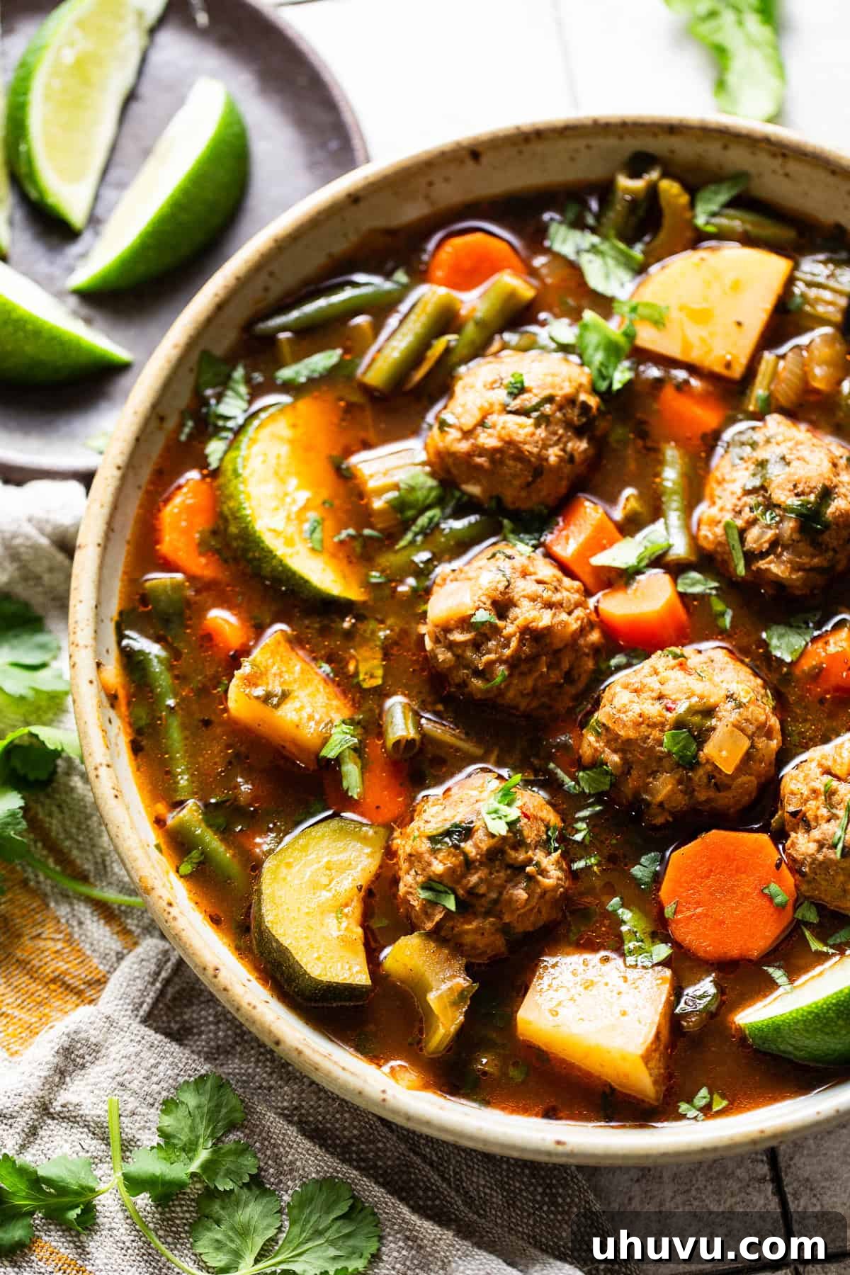 Albondigas soup recipe made with juicy Mexican meatballs made from beef, chorizo, and rice.