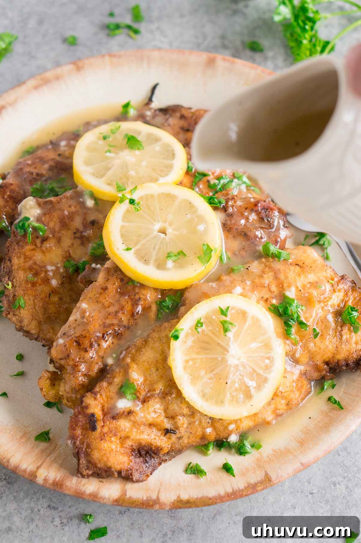 Steps for how to make Chicken Francese, showing the prepared chicken cutlets.