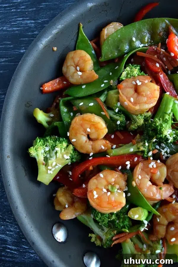 Quick Freezer Meals: Recipes and Time-Saving Hacks 20 A vibrant and healthy freezer meal of shrimp stir fry, ready to be enjoyed.