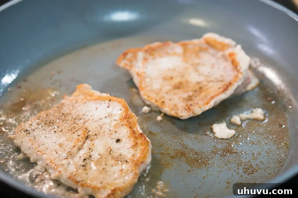 Seared pork tenderloins ready for the peach glaze