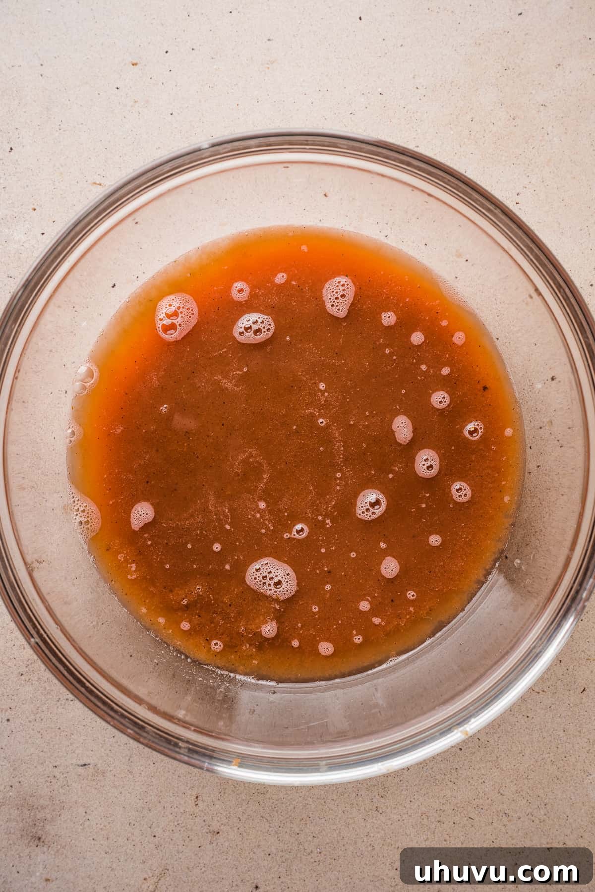 A rich, red tomato broth, ready for simmering, captured after being blended and strained for Sopa de Fideo.