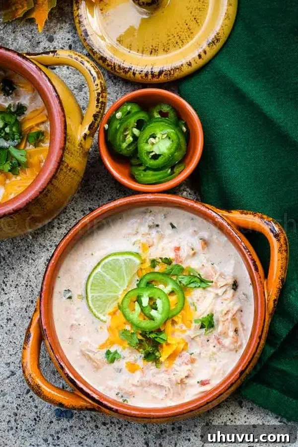 Easy Instant Pot recipe - chicken taco soup served in a cozy soup crock