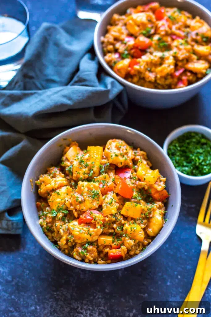 Easy Instant Pot recipe: Two bowls of flavorful jambalaya with rice, sausage, and shrimp