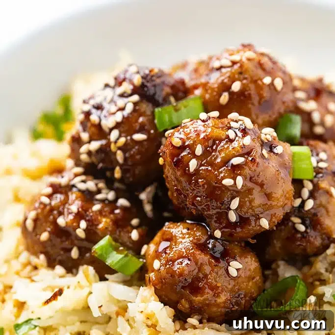 Effortless Meal Prep Guide 6 Keto Turkey meatballs over cauliflower rice with a garnish of herbs