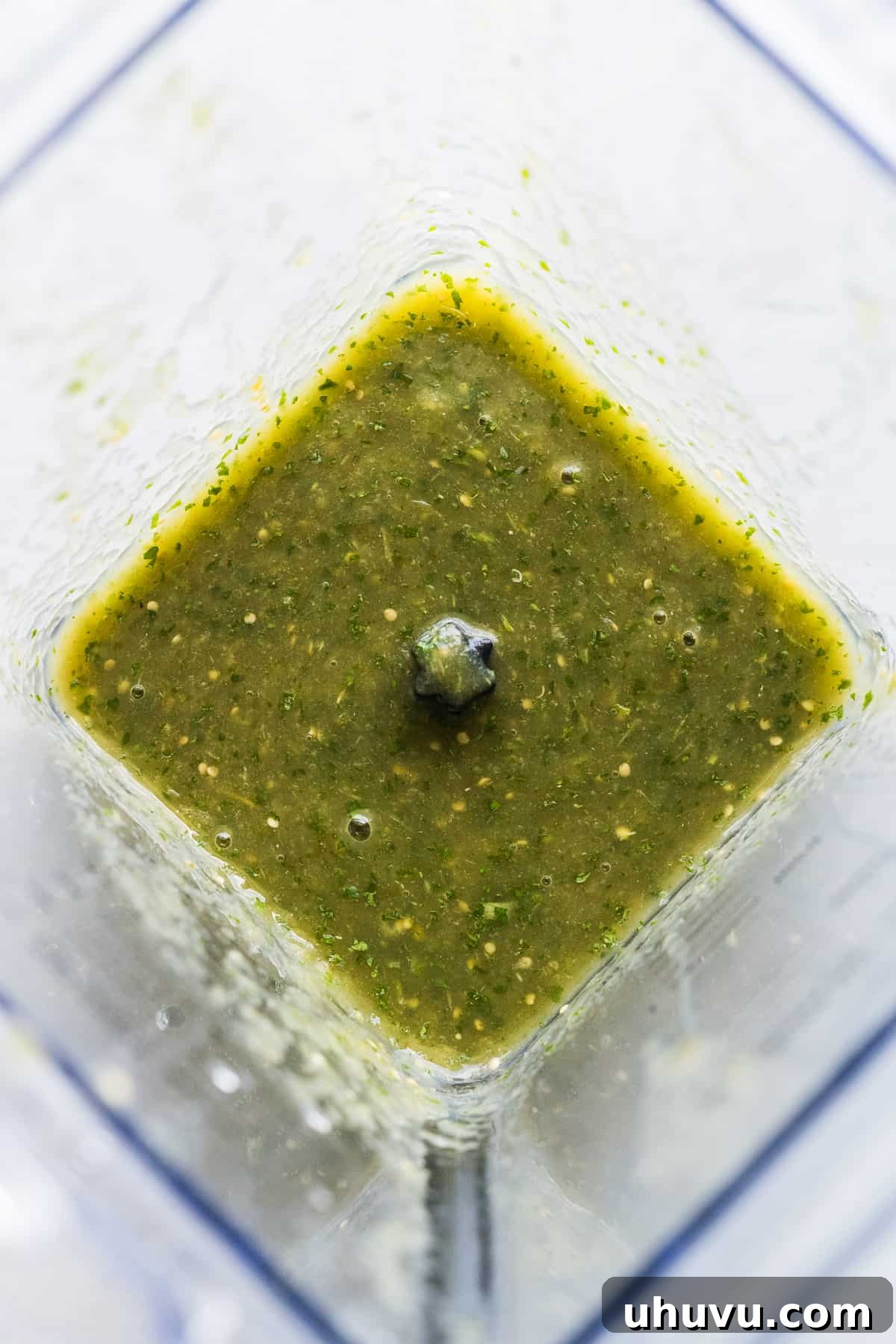 Creamy Tomatillo Enchiladas 4 Salsa verde in a blender blended with some cilantro.