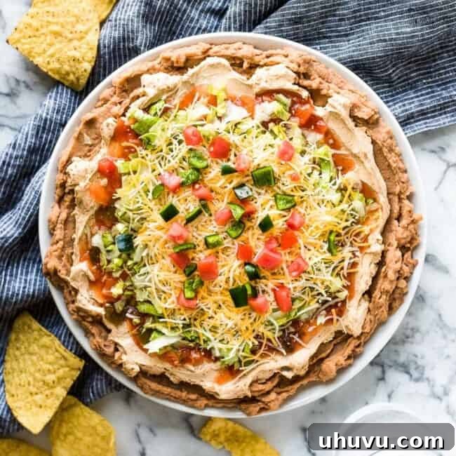 Fresh & Light Taco Dip 7 Healthy 5-Layer Taco Dip, perfect for parties and quick preparation.