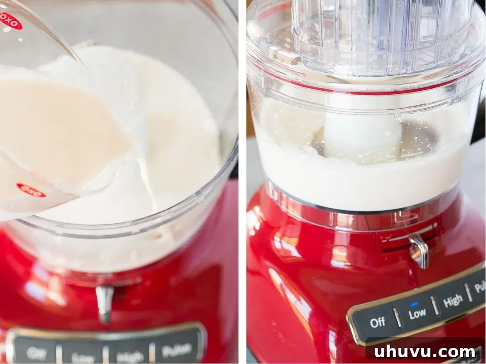 Pouring cream into a food processor to make butter