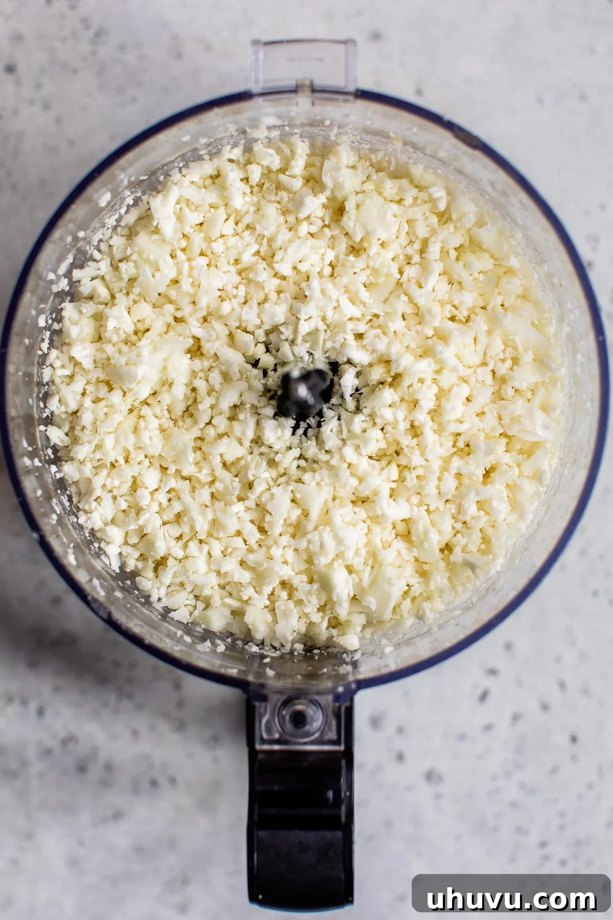Fiesta Cauliflower Rice 3 Riced cauliflower in a food processor.